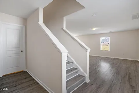 a view of entryway with wooden floor
