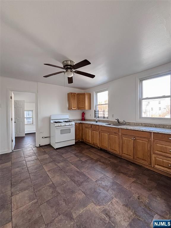9 Sparrow Street Paterson, NJ 07524 - Photo 15 of 20 a view of a kitchen with a sink and dishwasher