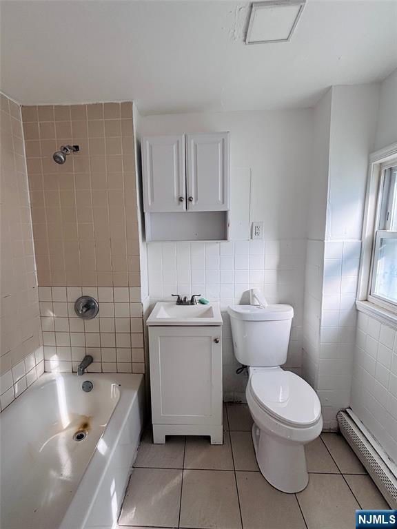 9 Sparrow Street Paterson, NJ 07524 - Photo 20 of 20 a bathroom with a sink toilet and bathtub