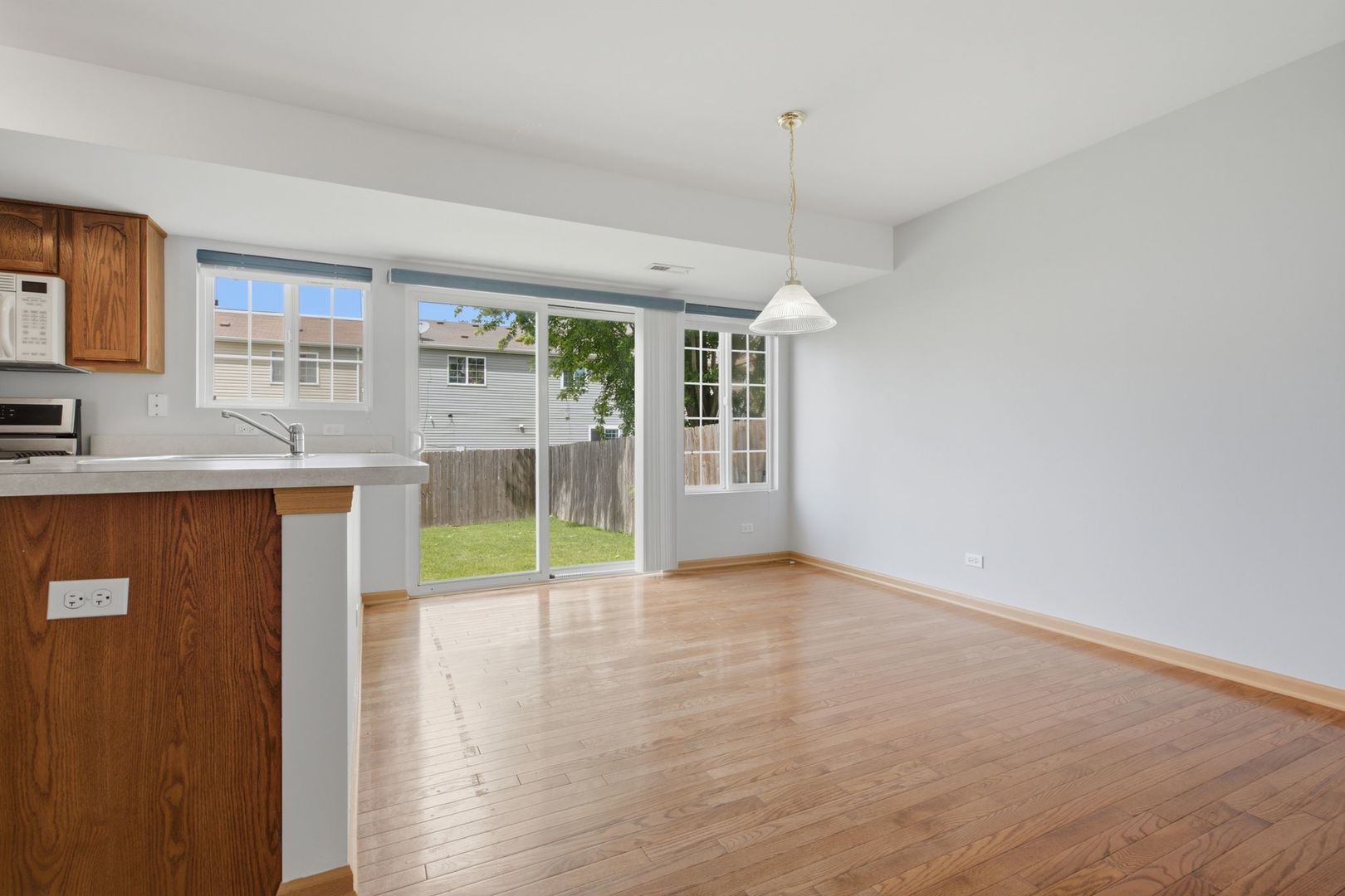 1758 Edith Lane Aurora, IL 60504 - Photo 7 of 28 a view of a kitchen with a sink and a window