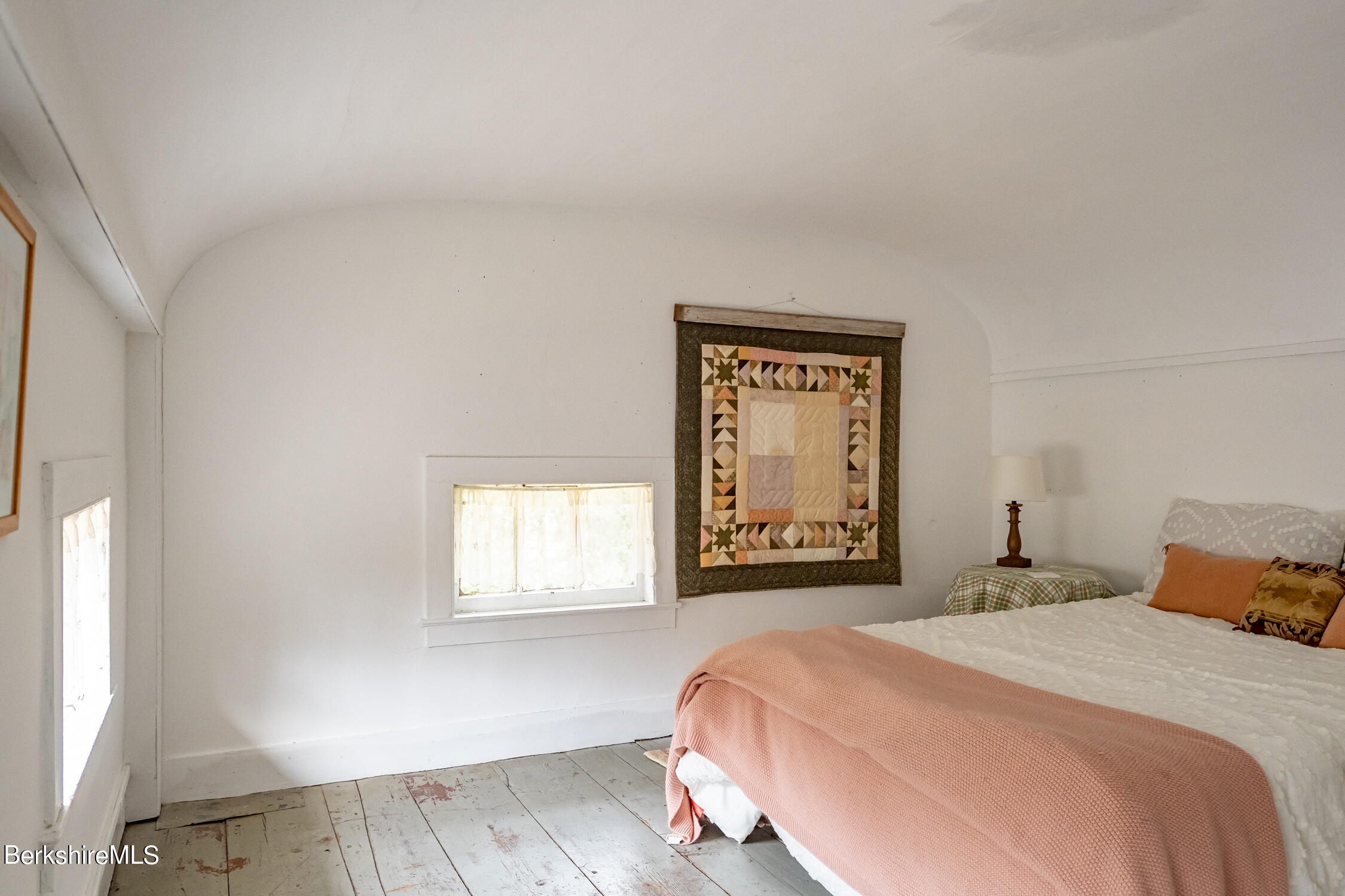 132 Sandisfield Road Sandisfield, MA 01255 - Photo 25 of 32 a bedroom with a bed and a window