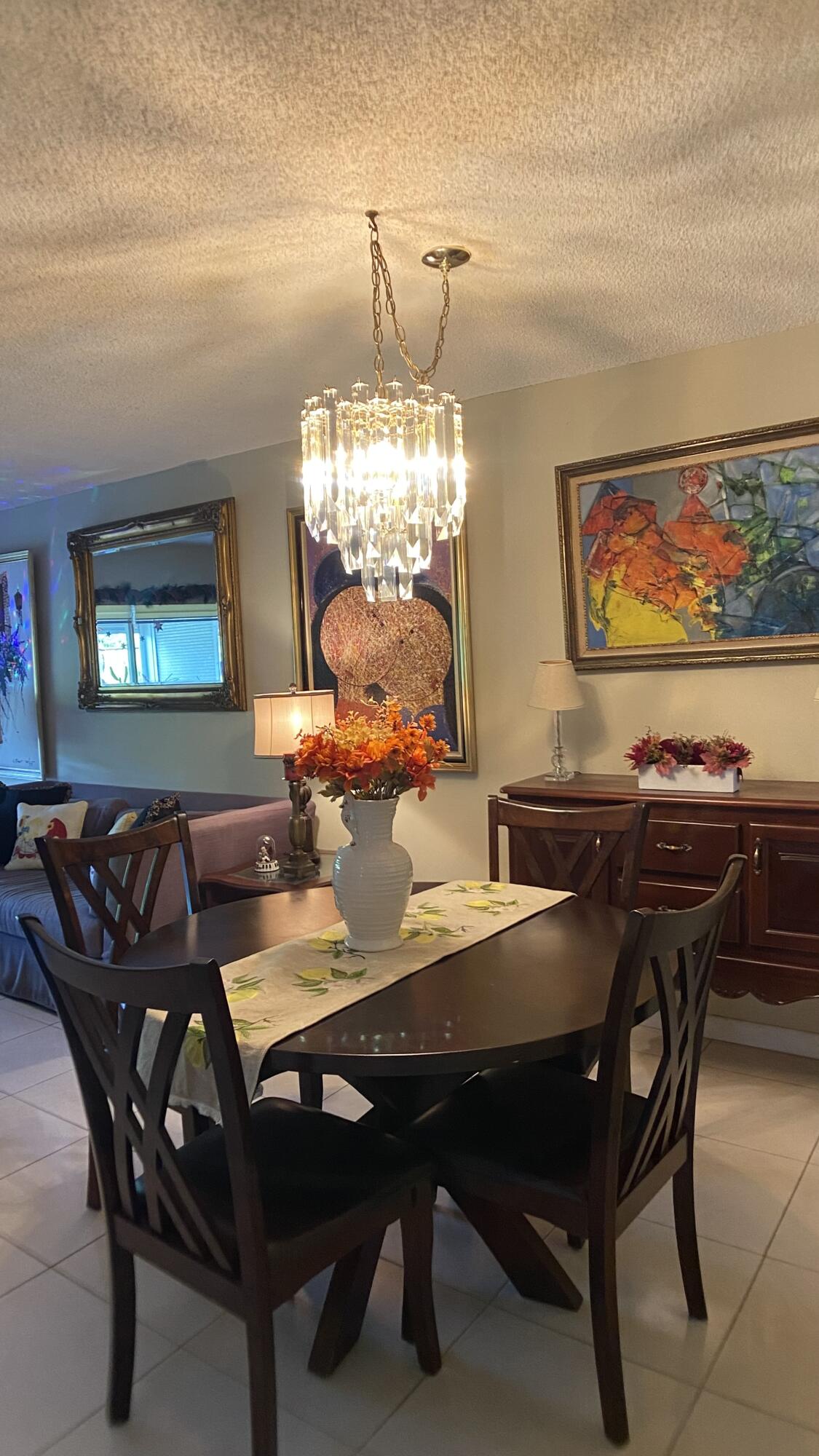 3070 Holiday Springs Boulevard, Unit 201 Margate, FL 33063 - Photo 12 of 30 a view of a dining room with furniture