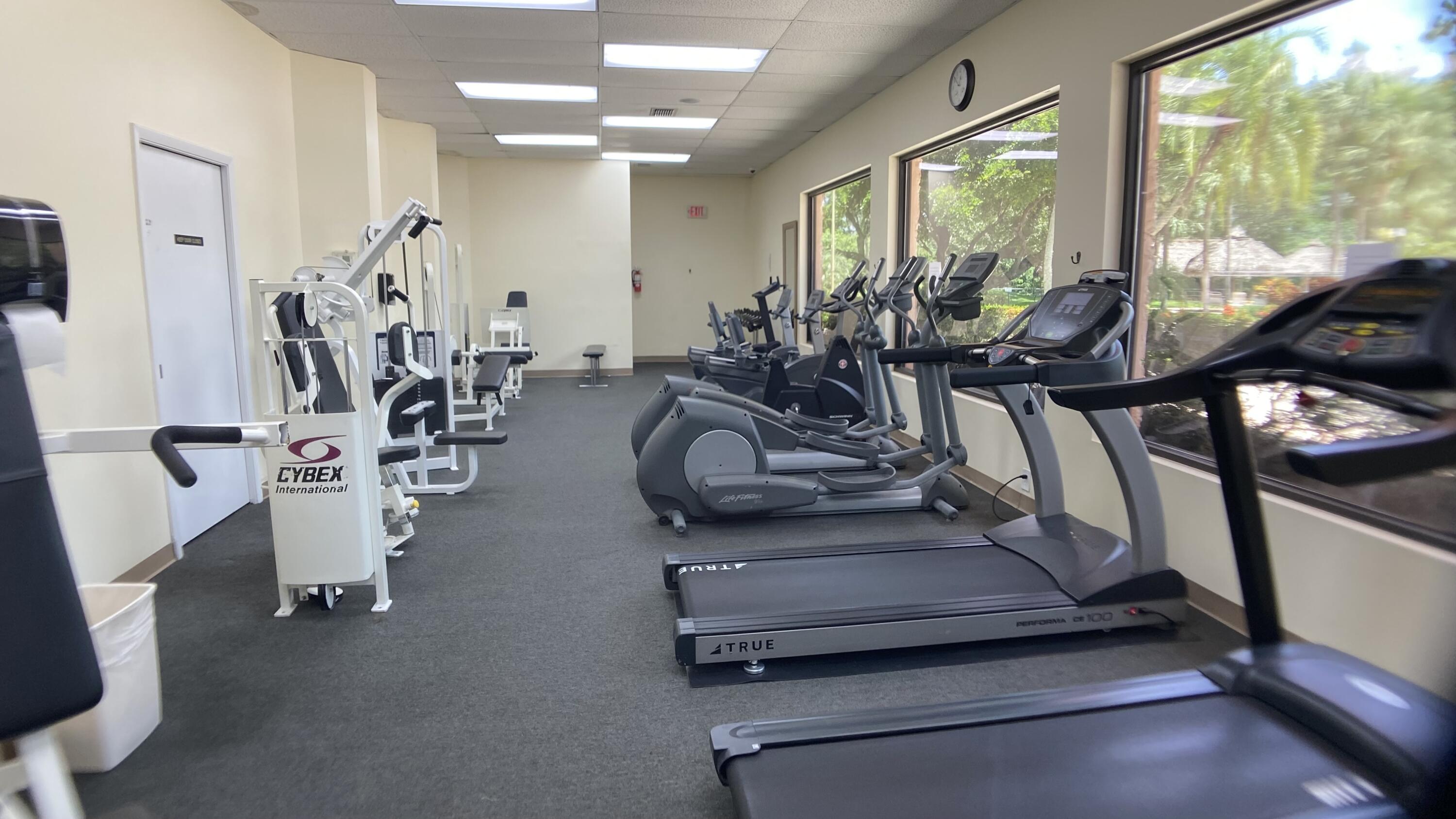 3070 Holiday Springs Boulevard, Unit 201 Margate, FL 33063 - Photo 27 of 30 a view of a room with gym equipment