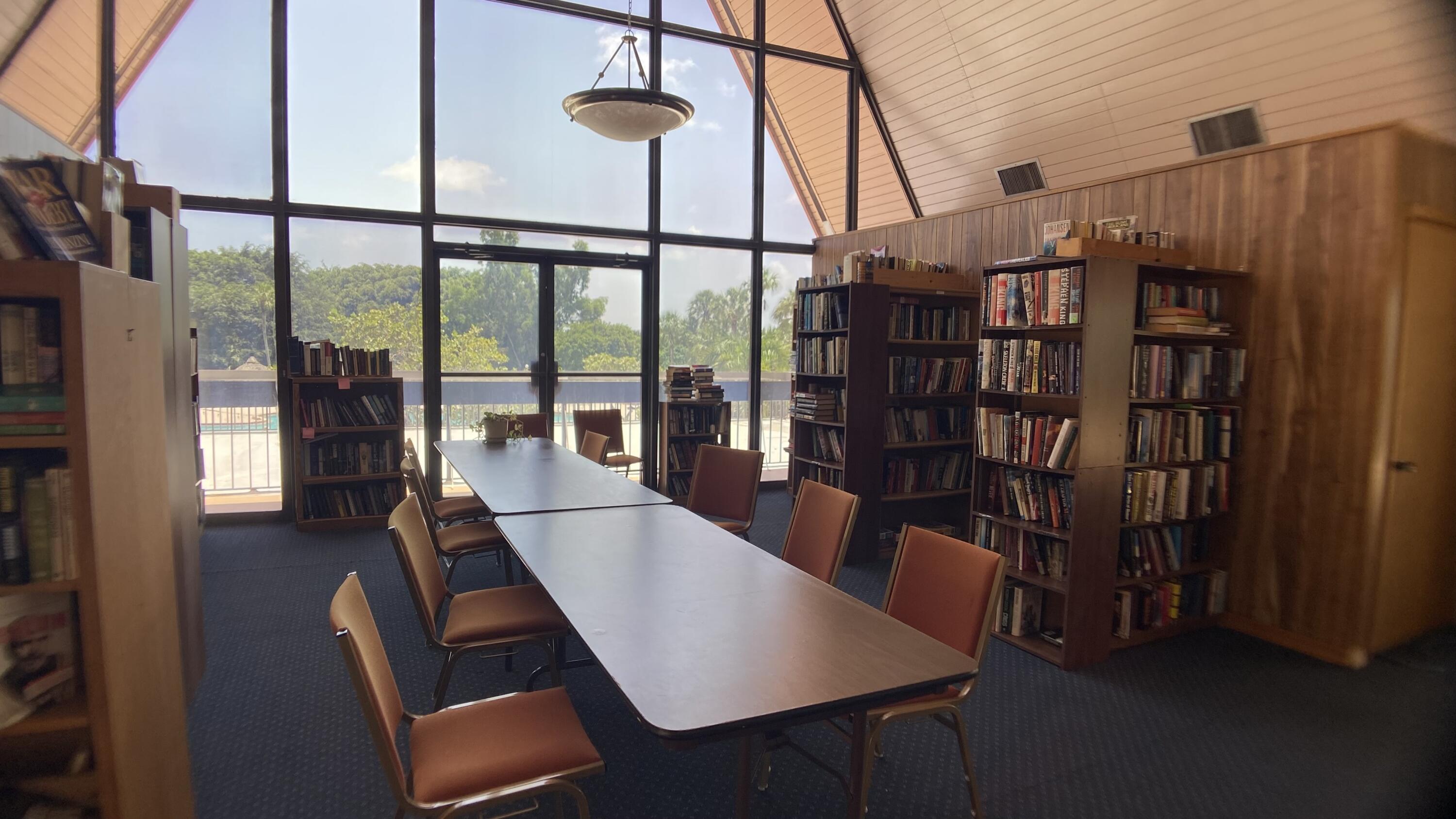3070 Holiday Springs Boulevard, Unit 201 Margate, FL 33063 - Photo 30 of 30 a view of a dining room with furniture window and wooden floor