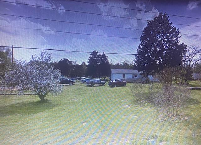 4924 Kedron Road Columbia, TN 38401 - Photo 1 of 1 a view of a street with a building in the background