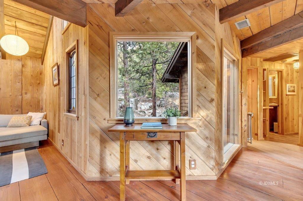 24631 Upper Rim Rock Road Idyllwild, CA 92549 - Photo 7 of 34 a very nice looking room with a large window and dining table