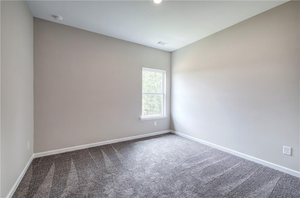 266 Eva Way Cartersville, GA 30121 - Photo 15 of 20 a view of an empty room with a window