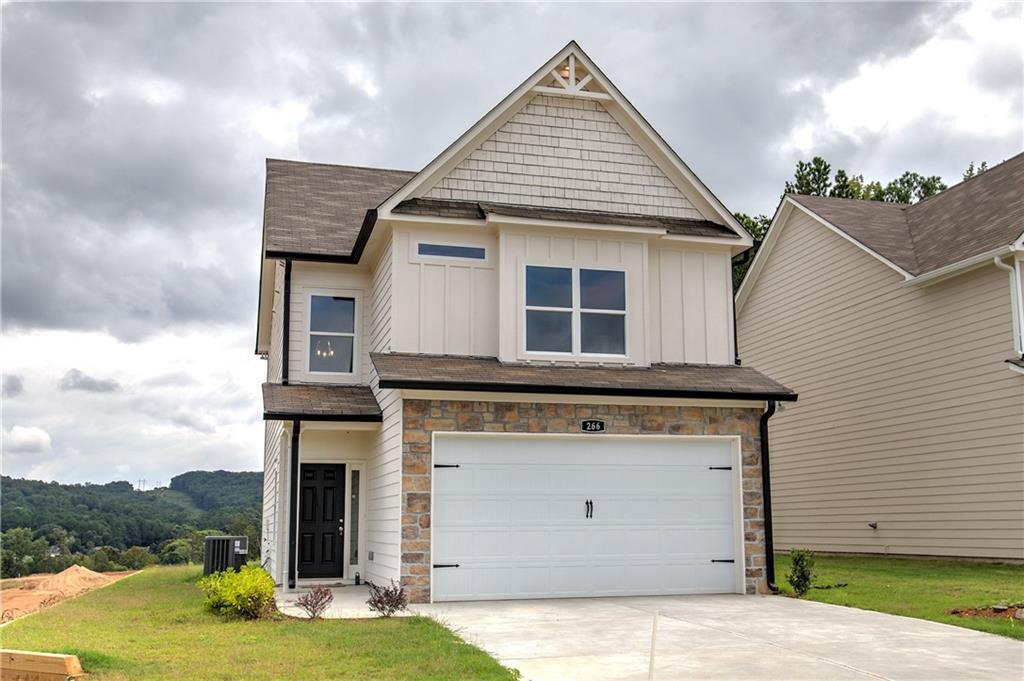 266 Eva Way Cartersville, GA 30121 - Photo 17 of 20 a view of a house with yard