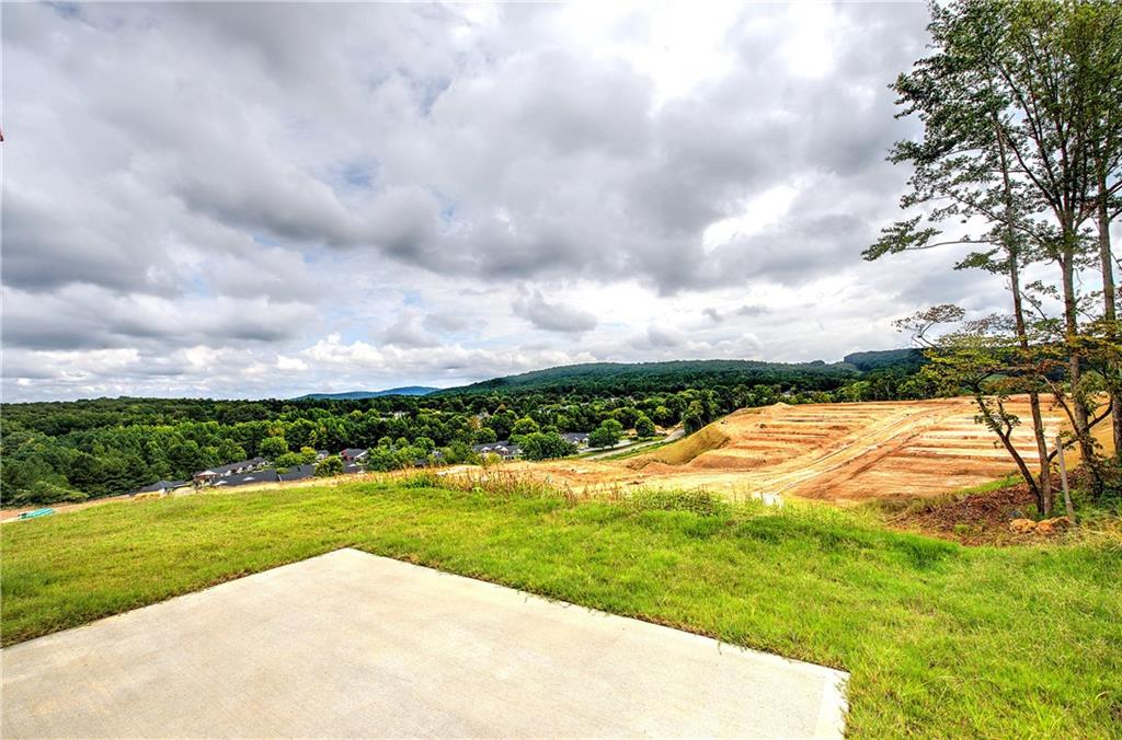 266 Eva Way Cartersville, GA 30121 - Photo 20 of 20 a view of swimming pool and mountain in back