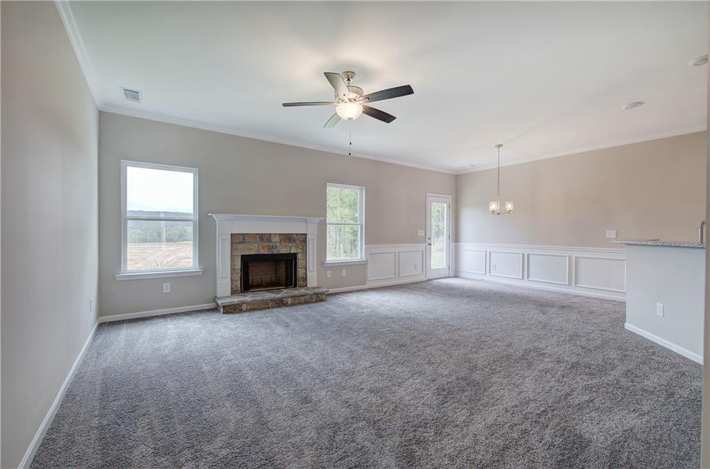 266 Eva Way Cartersville, GA 30121 - Photo 3 of 20 a view of empty room with a fireplace