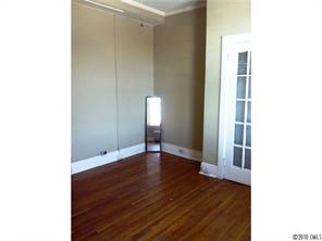 508 North Tryon Street, Unit 322 Charlotte, NC 28202 - Photo 3 of 7 a view of empty room with wooden floor