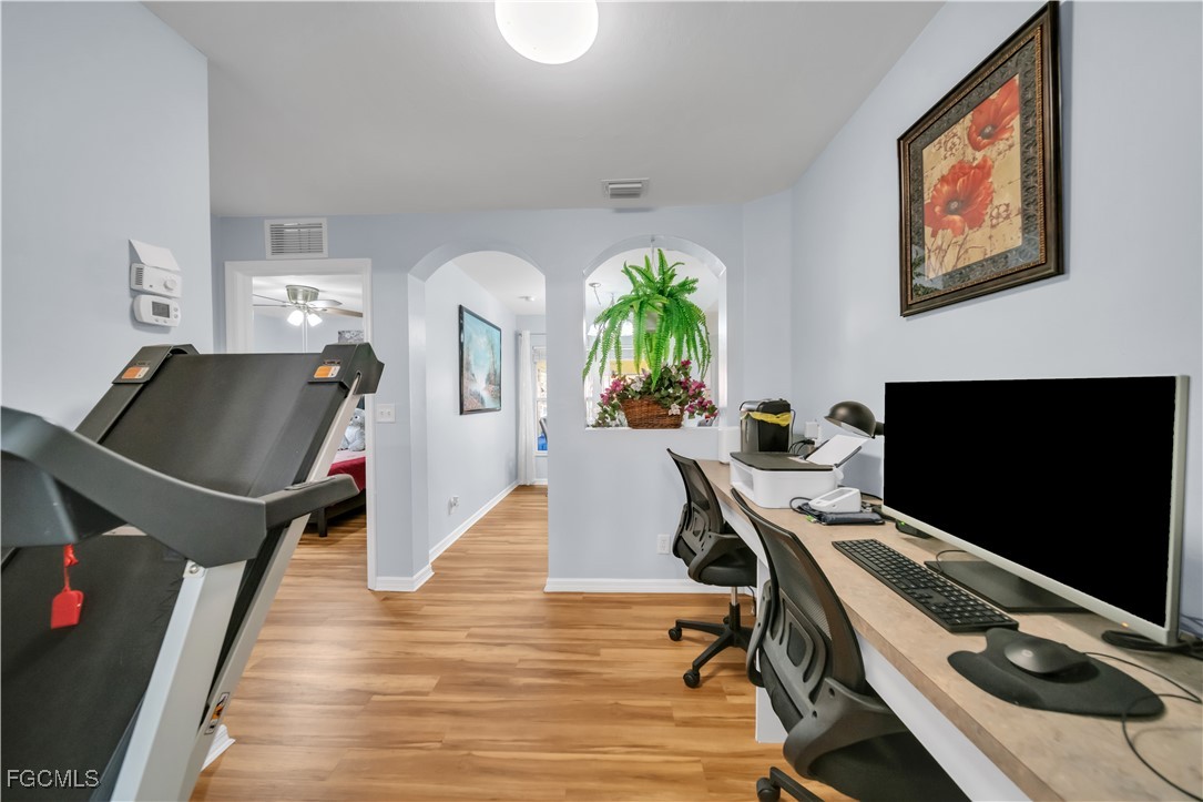 710 Homestead Road South Lehigh Acres, FL 33974 - Photo 14 of 38 a workspace with furniture and window