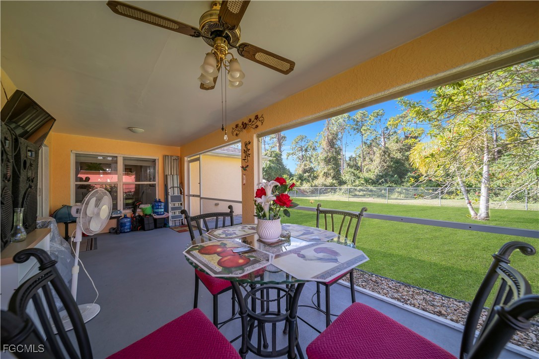 710 Homestead Road South Lehigh Acres, FL 33974 - Photo 31 of 38 a view of a dining room with furniture window and outside view