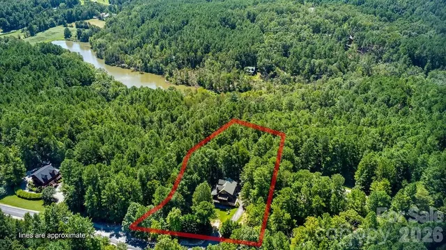 $575,000 | 447 Hidden Lake Parkway, Nebo, NC 28761
