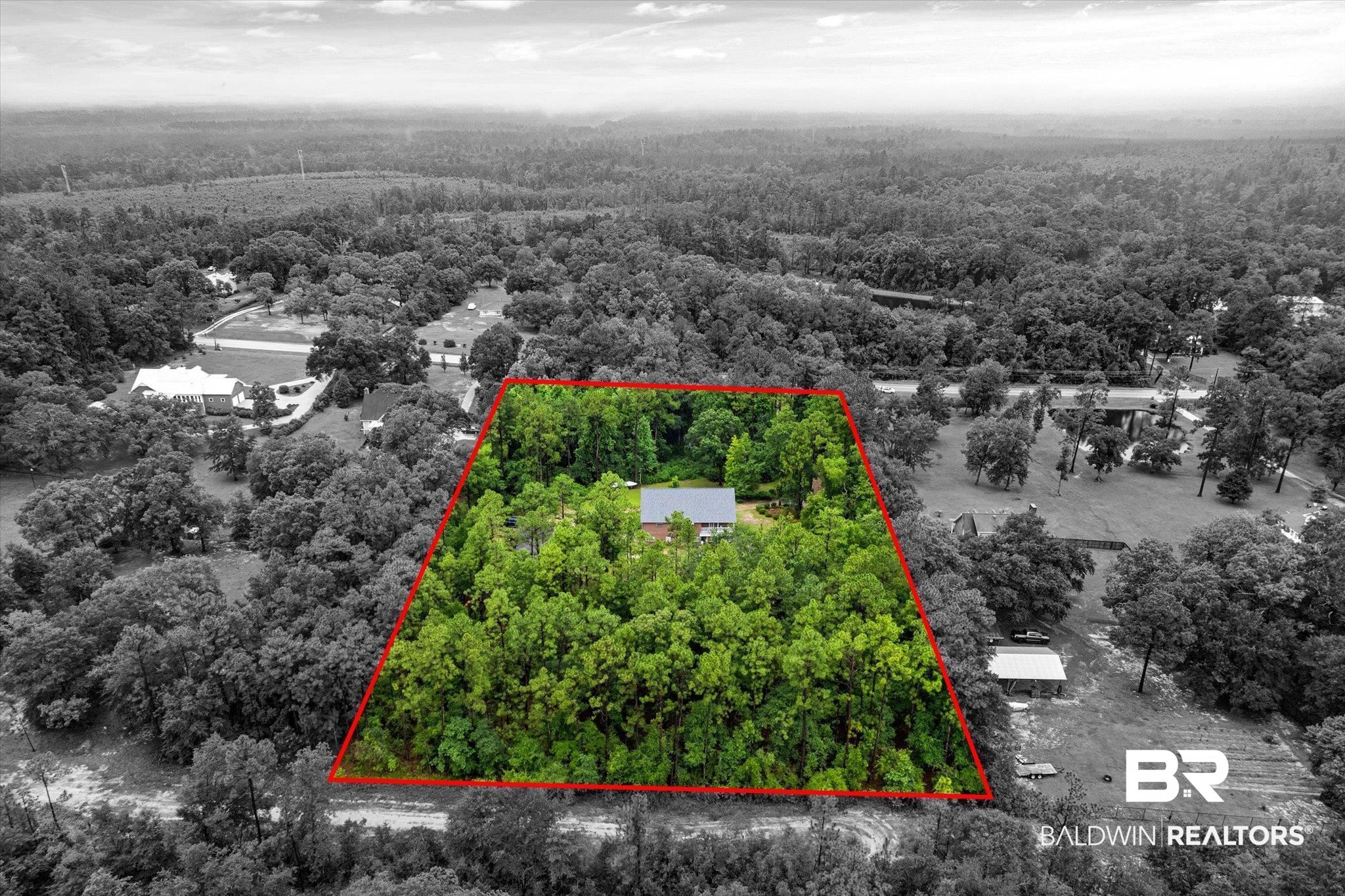 2300 Radcliff Road Saraland, AL 36571 - Photo 51 of 56 View of property location with a heavily wooded area and property parcel outlined