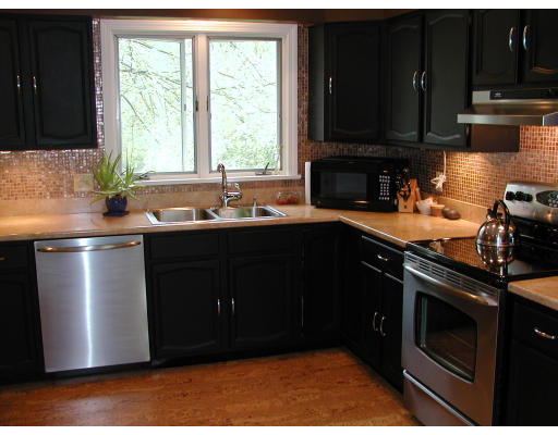 856 Burts Pit Road Northampton, MA 01062 - Photo 20 of 22 a kitchen with a sink and a stove