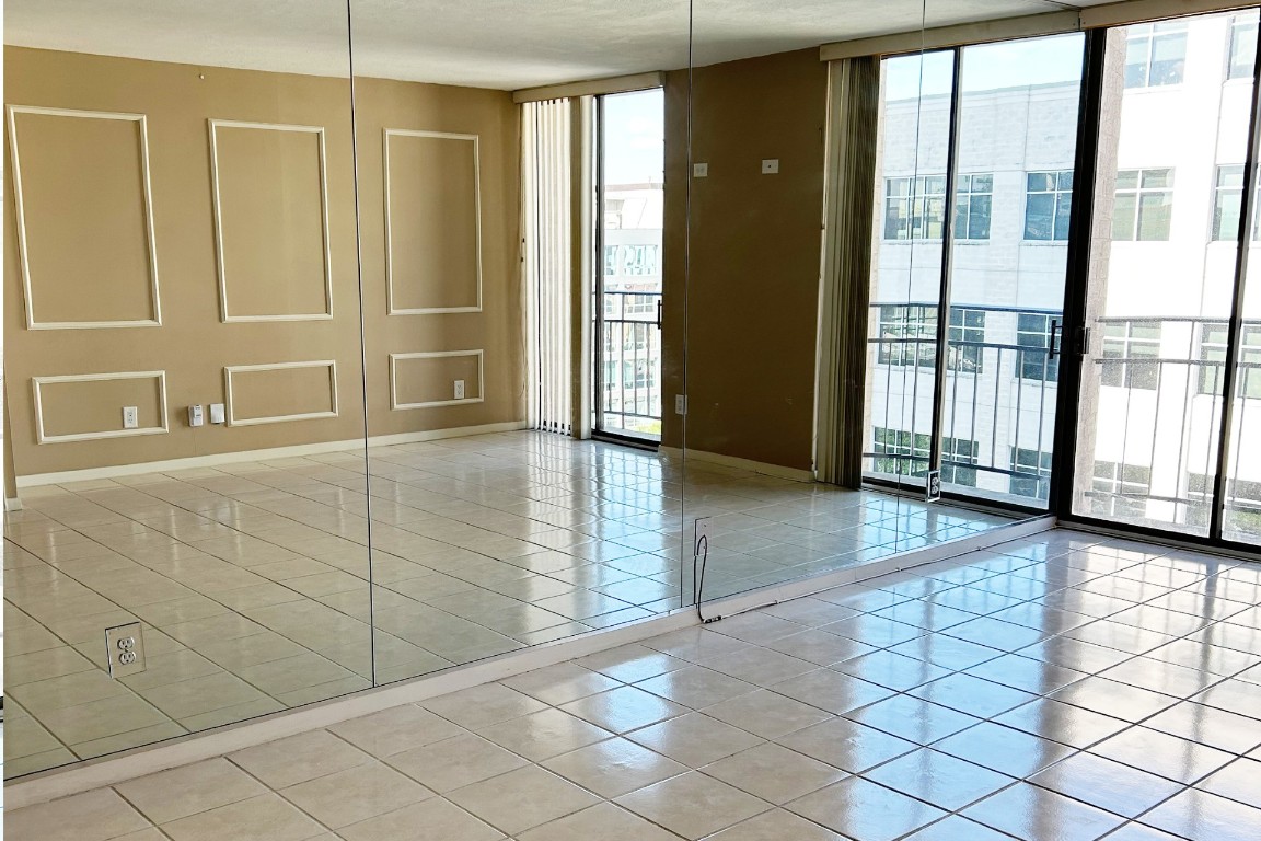 1122 Colorado Street, Unit 1101 Austin, TX 78701 - Photo 2 of 17 a view of an entryway with wooden floor