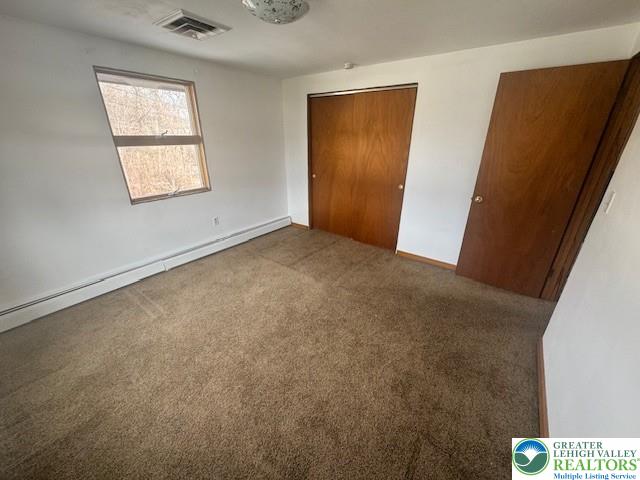 2565 Gap View Road, Unit 1 2565 Slatington, PA 18080 - Photo 3 of 11 an empty room with windows and closet