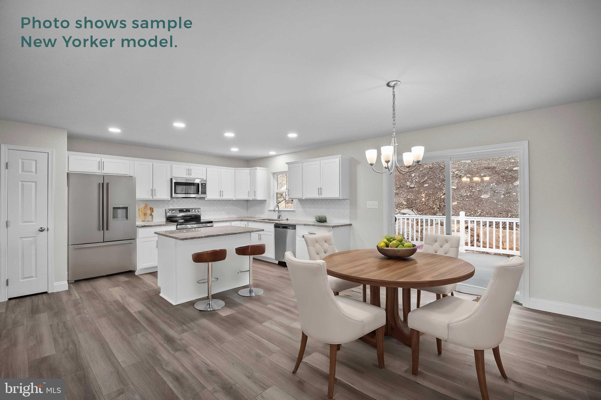 9 Country Club Road Ashland, PA 17921 - Photo 12 of 34 a kitchen with a table and chairs in it