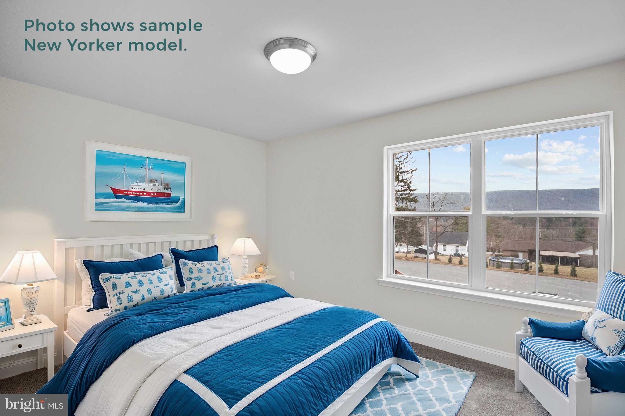 9 Country Club Road Ashland, PA 17921 - Photo 18 of 34 a bedroom with a bed and a large window