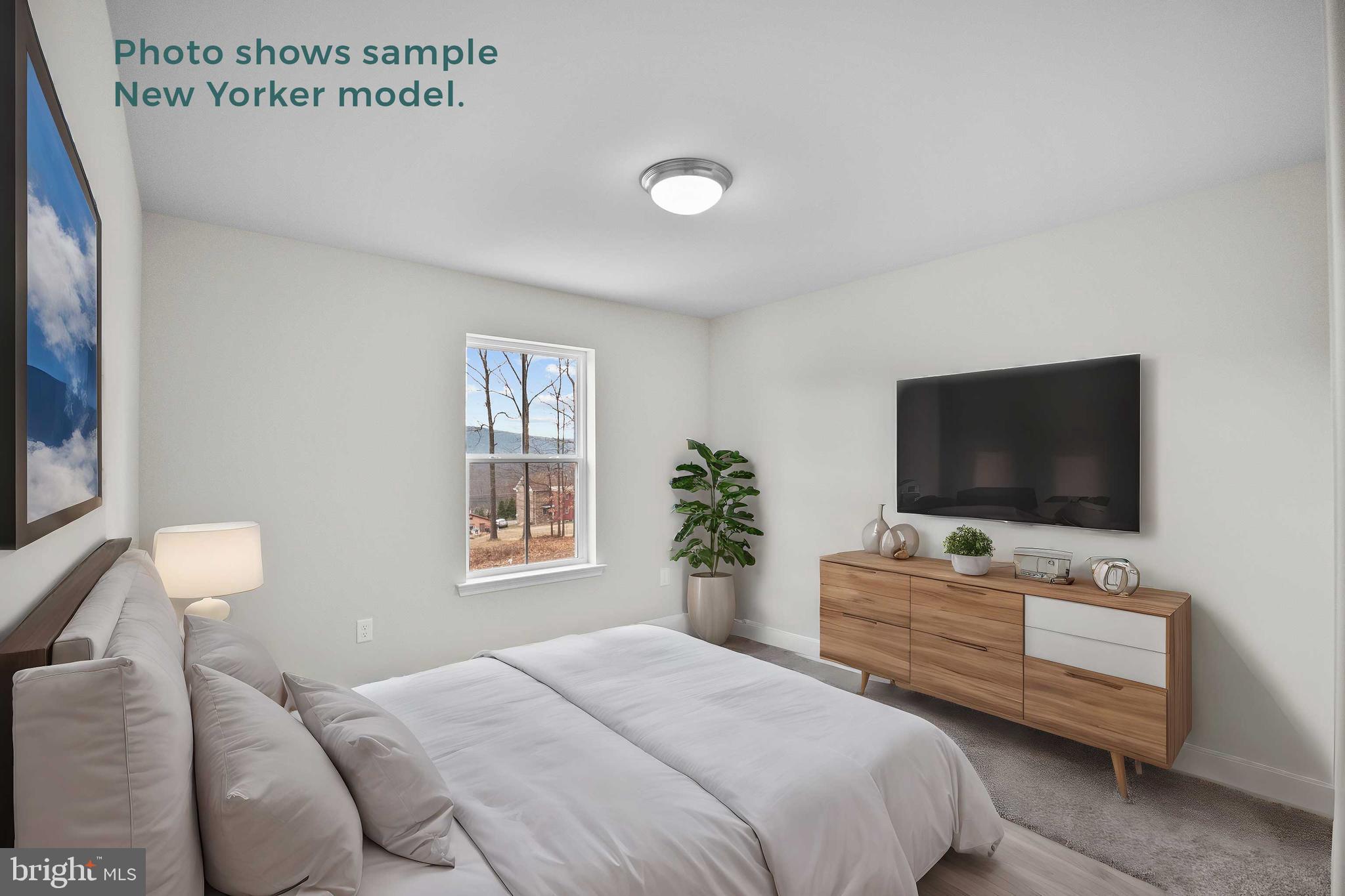 9 Country Club Road Ashland, PA 17921 - Photo 21 of 34 a bedroom with bed tv and window