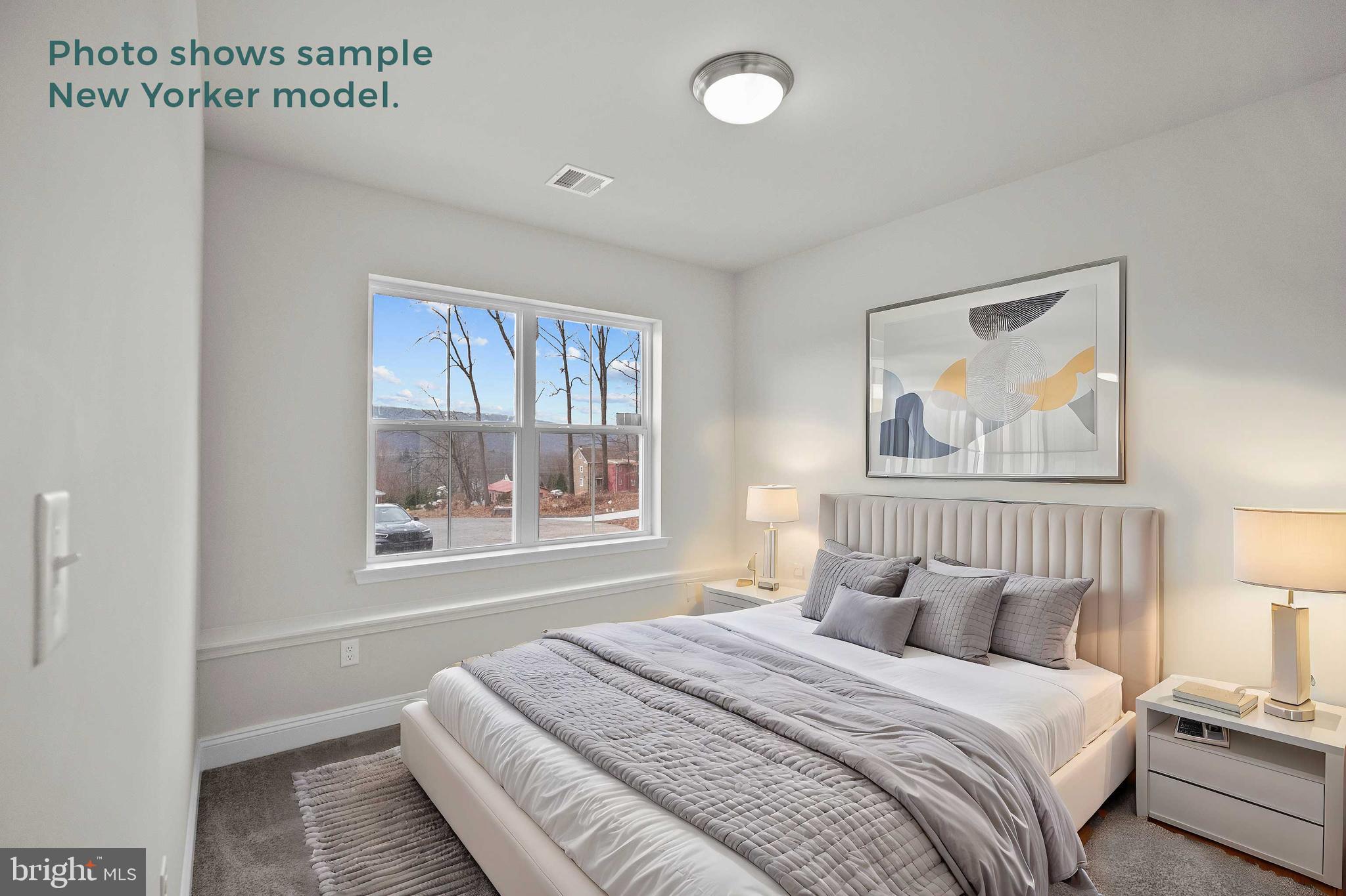 9 Country Club Road Ashland, PA 17921 - Photo 23 of 34 a bedroom with a bed painting on the wall and a window