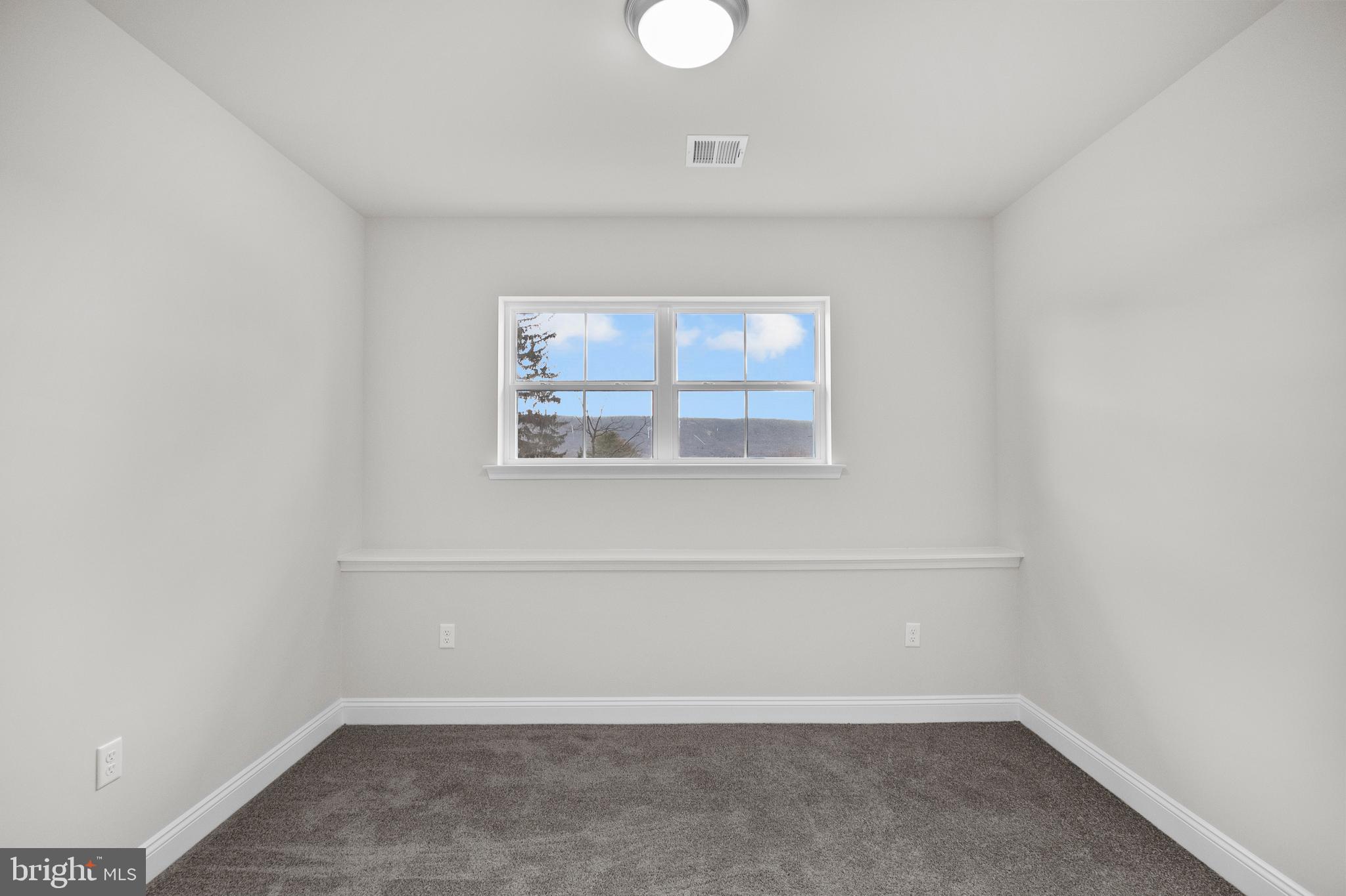 9 Country Club Road Ashland, PA 17921 - Photo 30 of 34 an empty room with a window