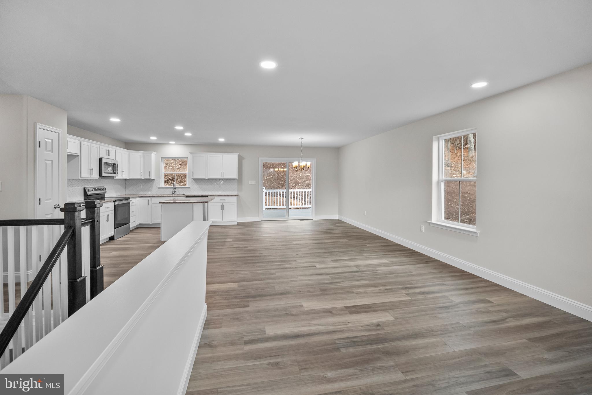 9 Country Club Road Ashland, PA 17921 - Photo 6 of 34 a view of a kitchen with wooden floor and electronic appliances