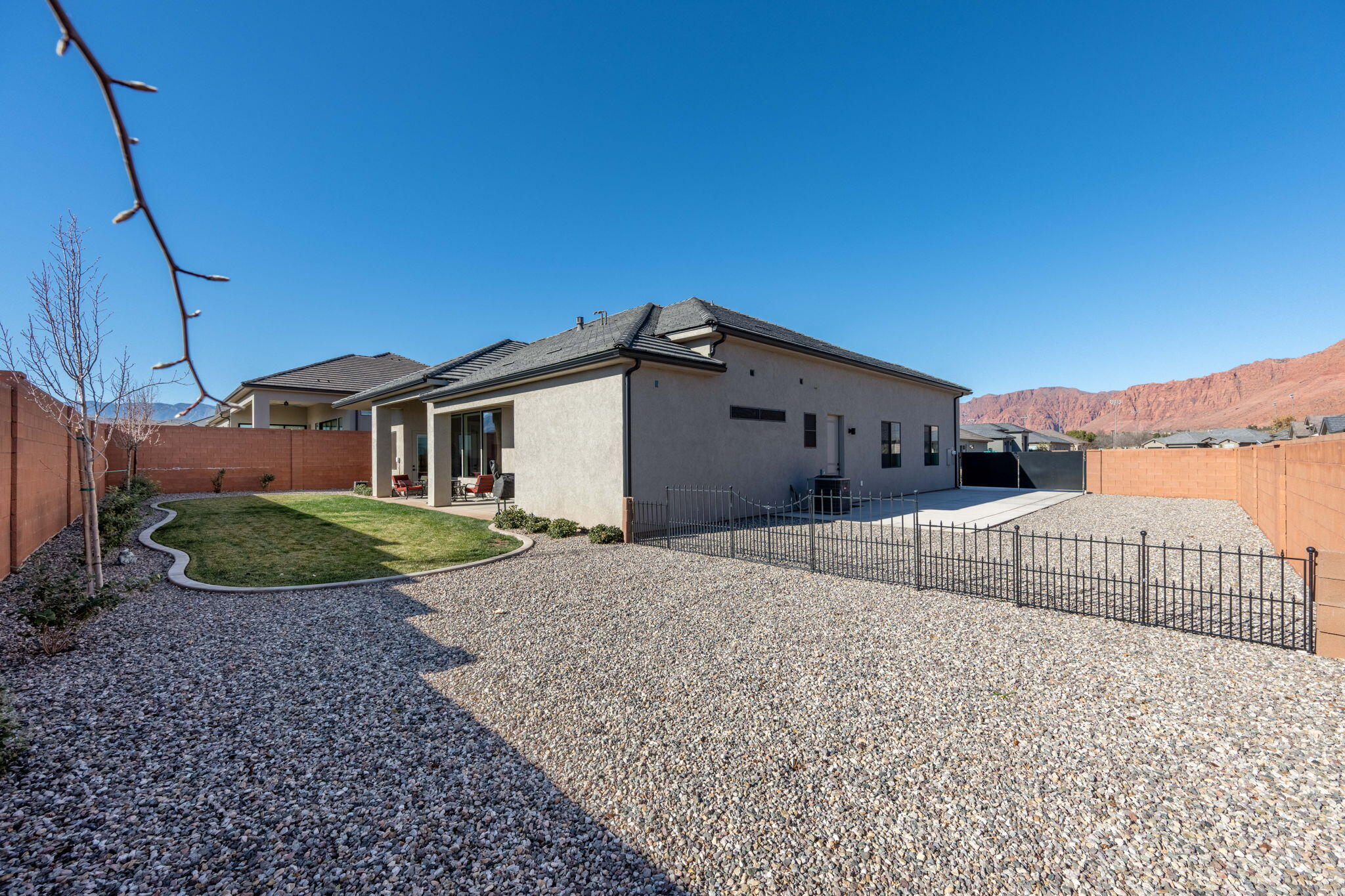227 United Way Ivins, UT 84738 - Photo 2 of 28 Expansive lot offering ample space for a custom pool, framed by breathtaking red rock mountain views.
