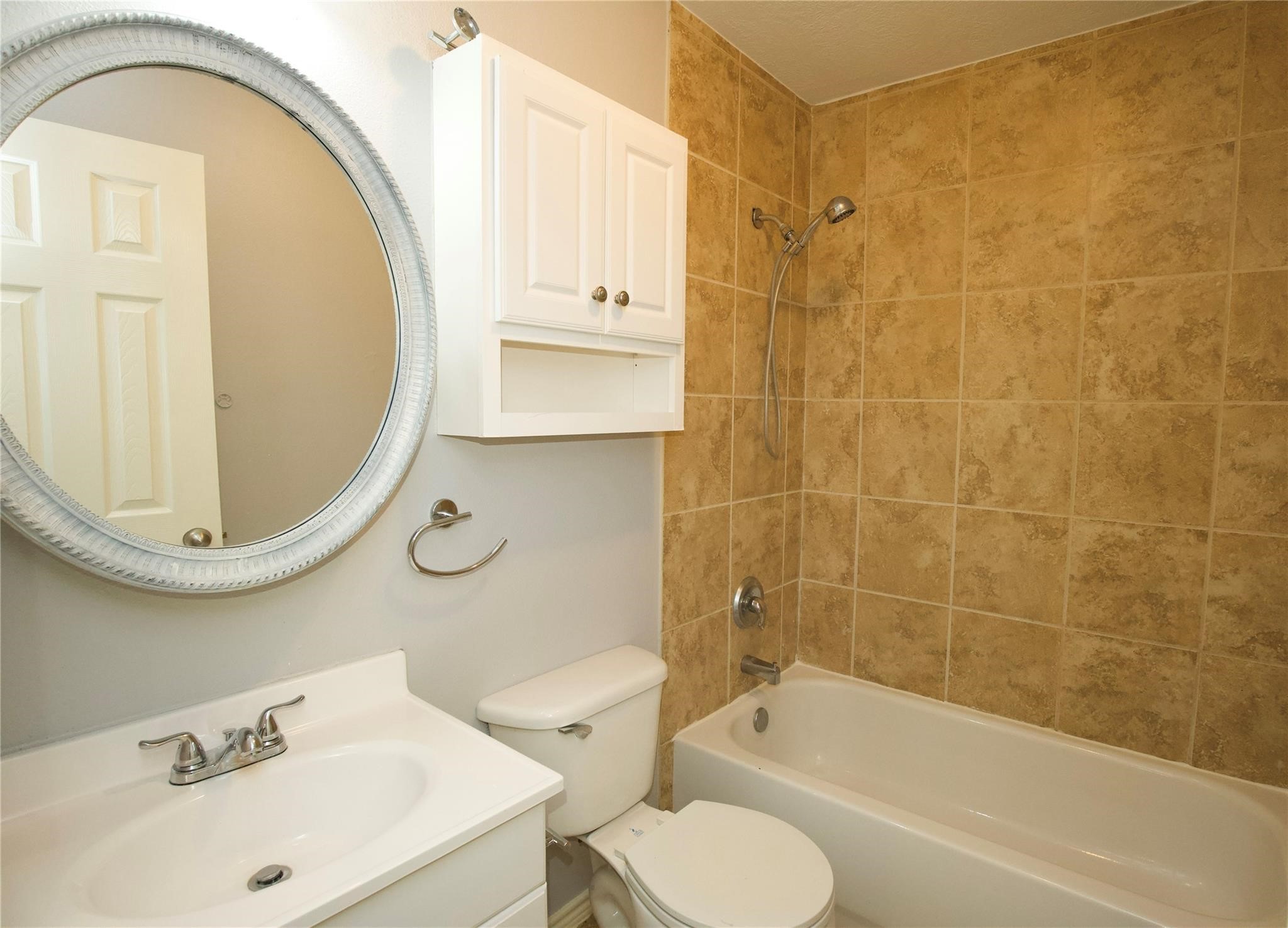 2419 Fox Water Drive Spring, TX 77386 - Photo 14 of 19 a bathroom with a sink mirror toilet and bathtub
