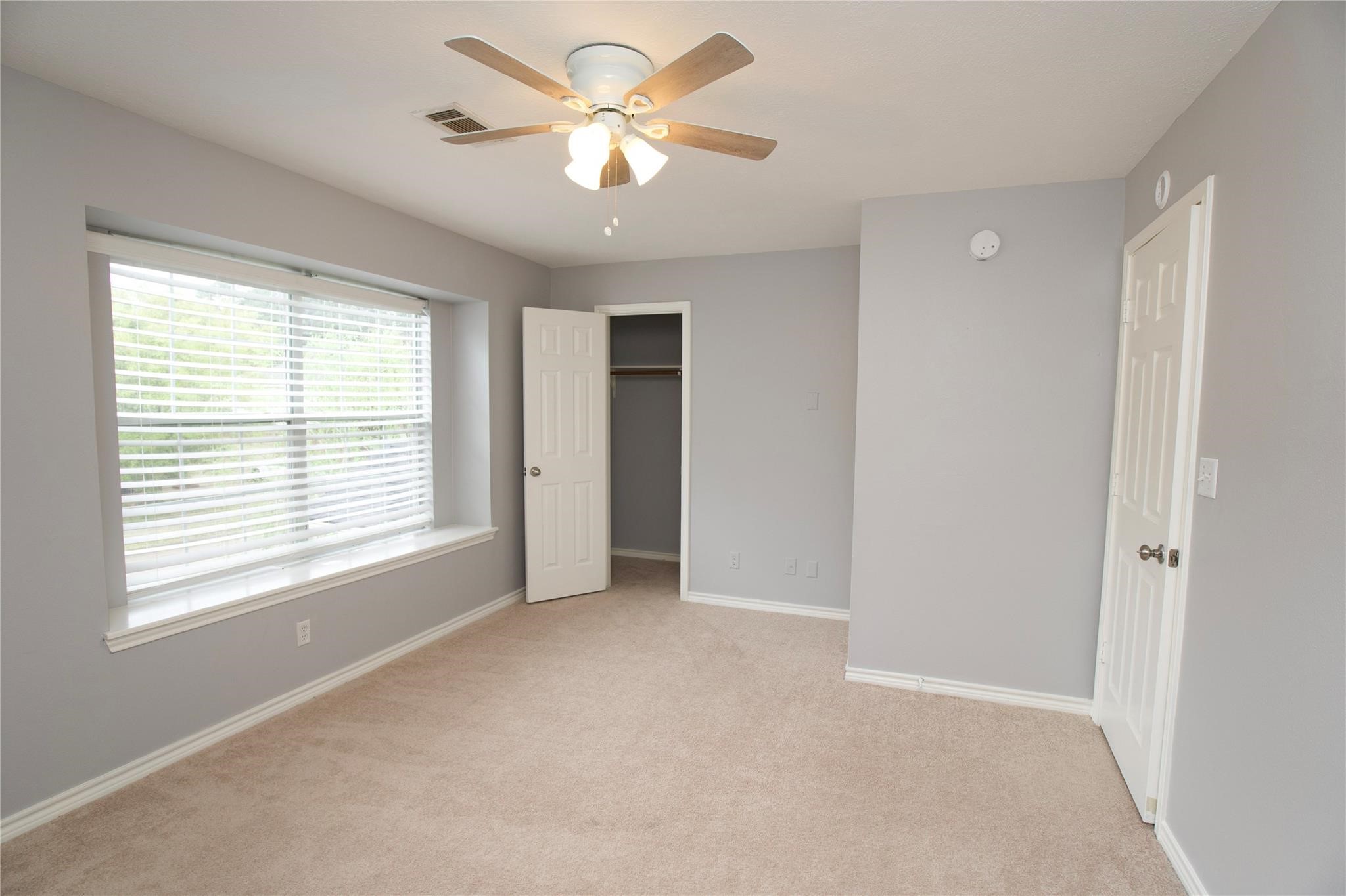 2419 Fox Water Drive Spring, TX 77386 - Photo 15 of 19 a view of an empty room with a window