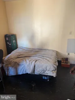 a view of a living room with a flat screen tv