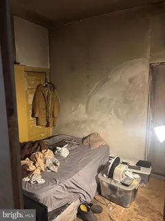 a kitchen with a stove and a refrigerator