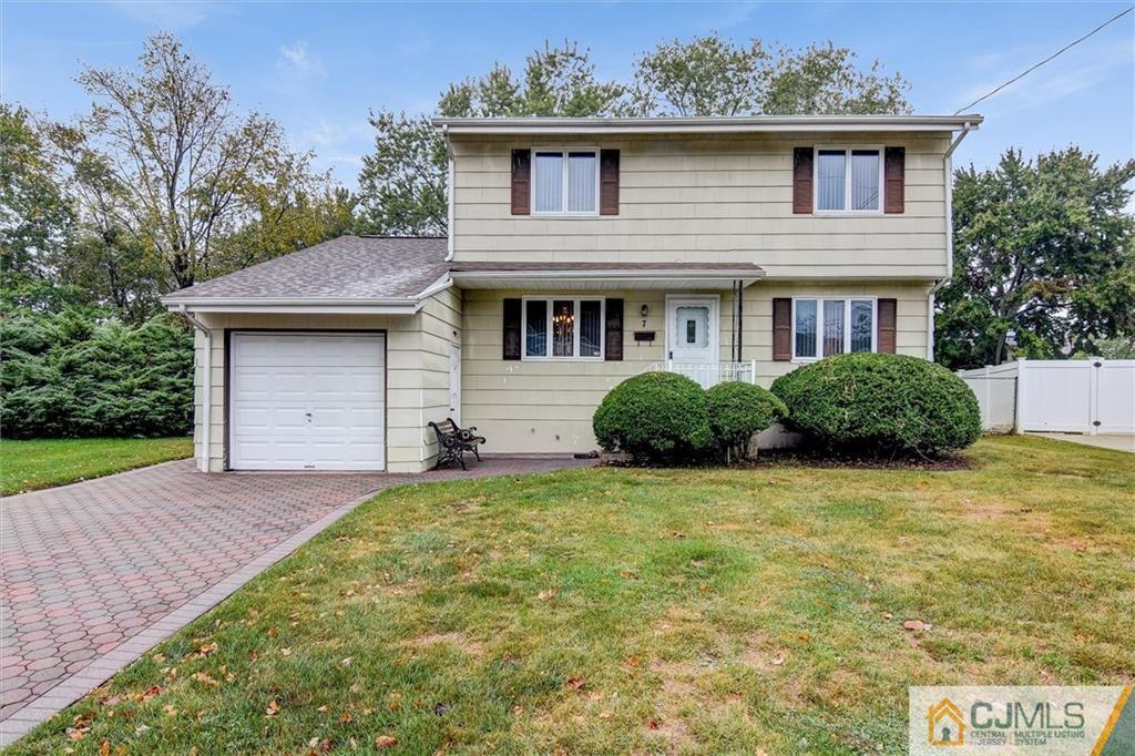 7 Arden Road Old Bridge, NJ 08857 - Photo 1 of 18 a front view of a house with garden