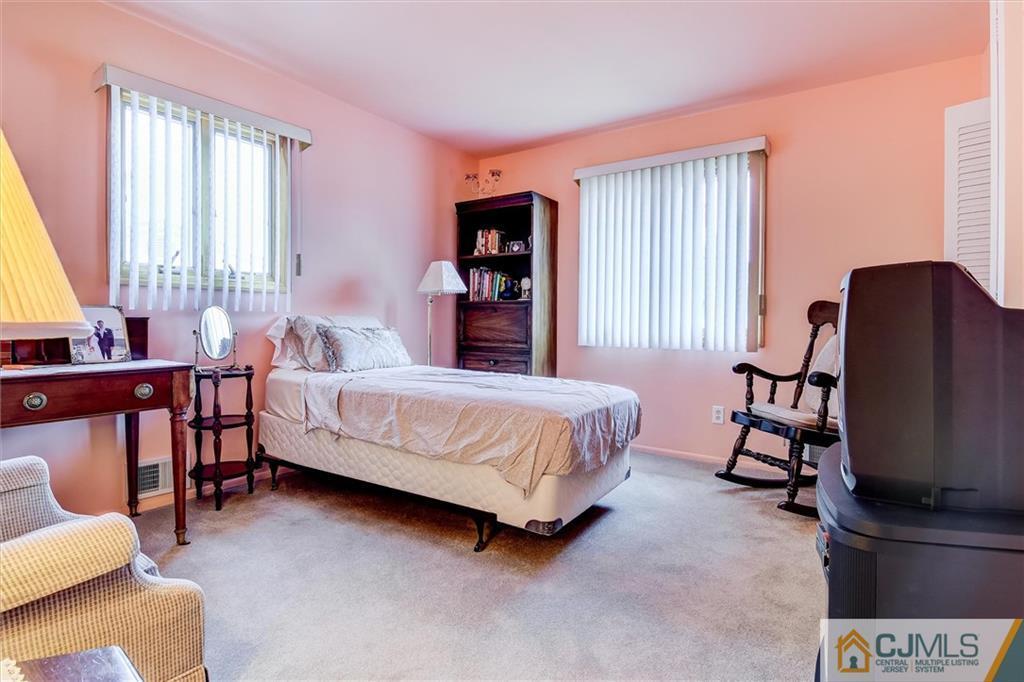 7 Arden Road Old Bridge, NJ 08857 - Photo 11 of 18 a bedroom with a bed chair and window