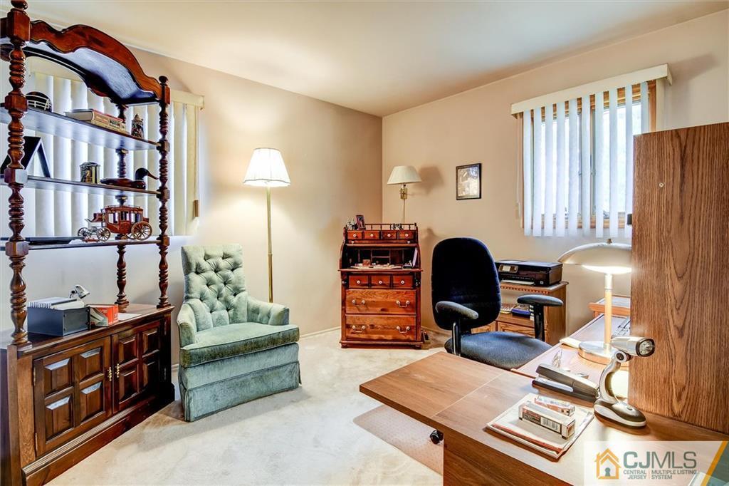 7 Arden Road Old Bridge, NJ 08857 - Photo 13 of 18 a view of a workspace with furniture and a bedroom
