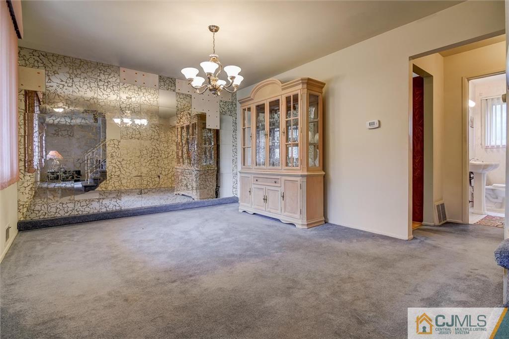 7 Arden Road Old Bridge, NJ 08857 - Photo 2 of 18 a view of a room with chandelier and windows