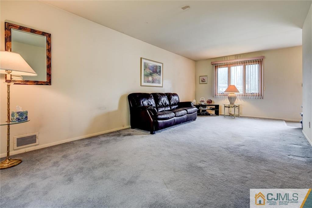 7 Arden Road Old Bridge, NJ 08857 - Photo 8 of 18 a living room with furniture and a window