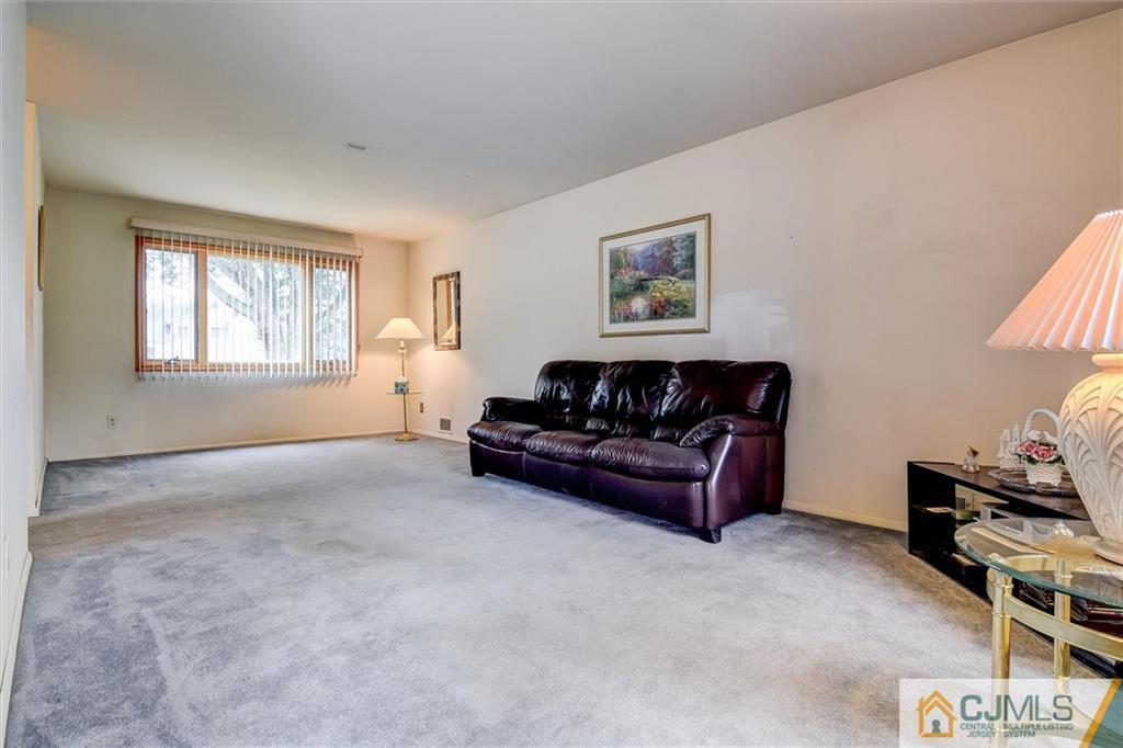 7 Arden Road Old Bridge, NJ 08857 - Photo 10 of 18 a living room with furniture and a window