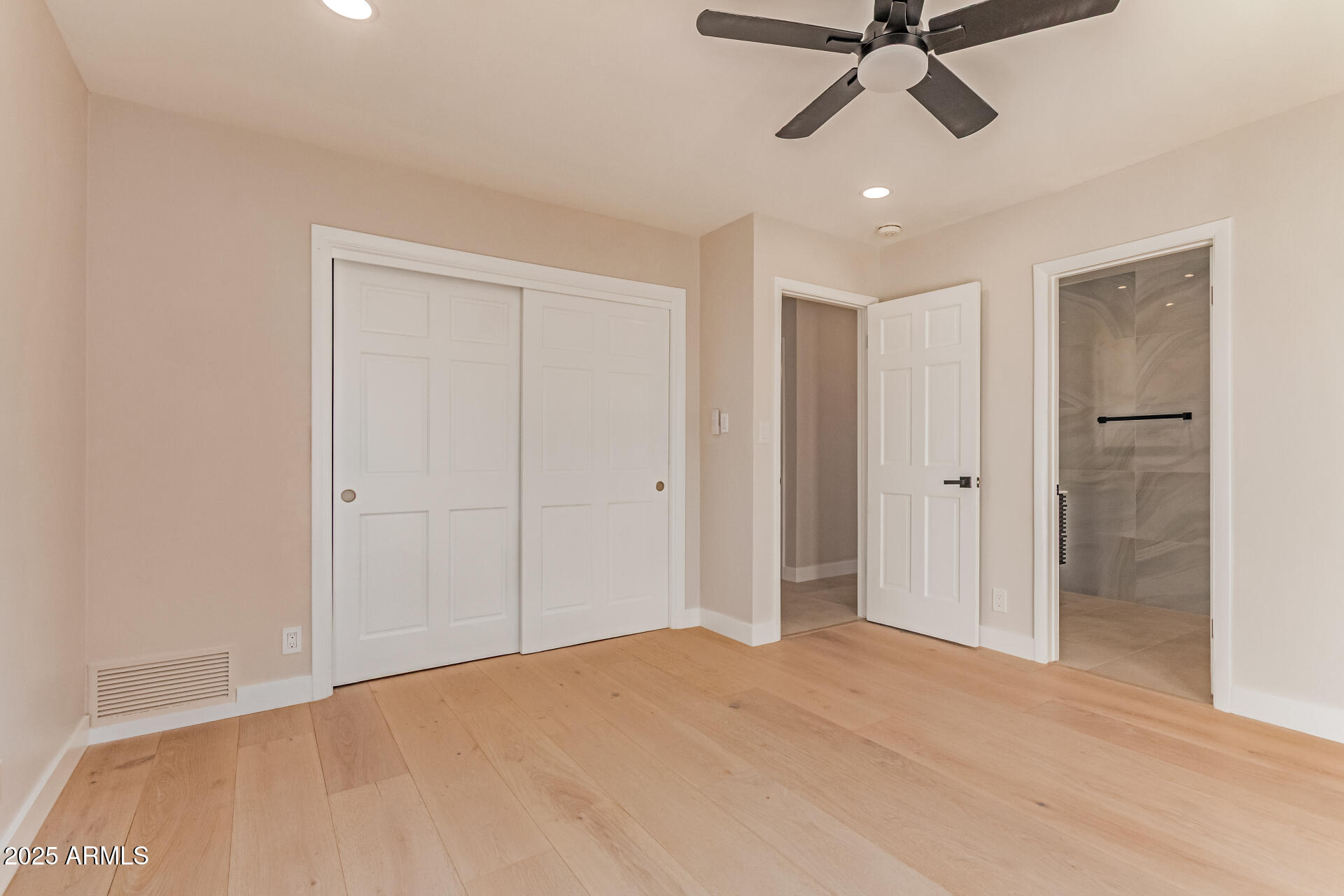 3301 East Rovey Avenue Paradise Valley, AZ 85253 - Photo 53 of 105 a view of a room with a ceiling fan and entryway