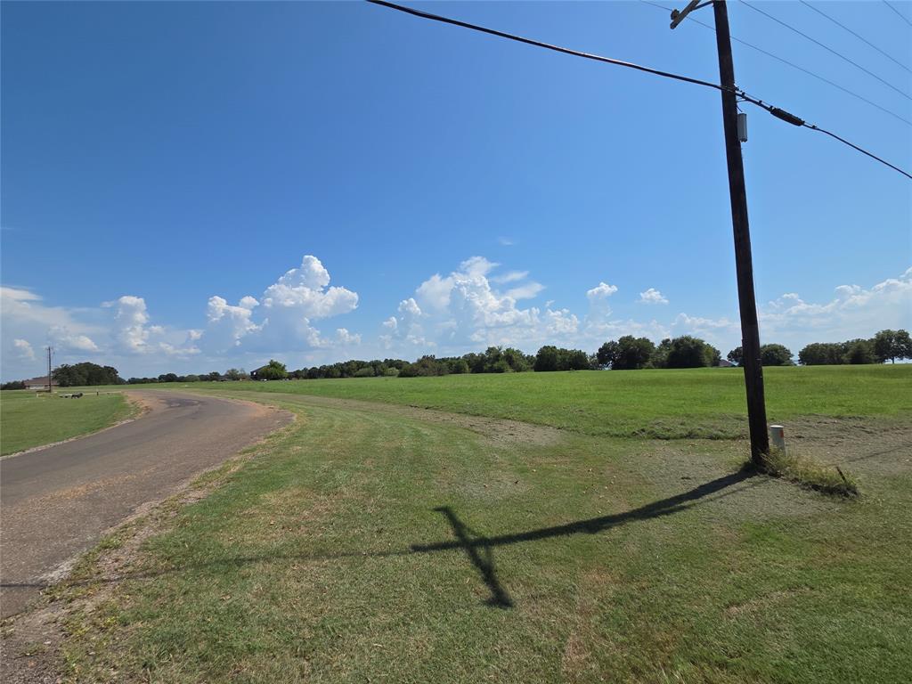 Lot 72 Tonkawa Trail Corsicana, TX 75109 - Photo 17 of 40 a view of a lake with a big yard
