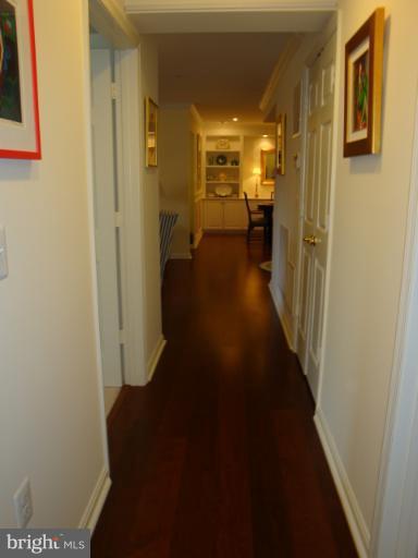 12021 Tralee Road, Unit 201 Lutherville-Timonium, MD 21093 - Photo 13 of 30 a view of a hallway with wooden floor