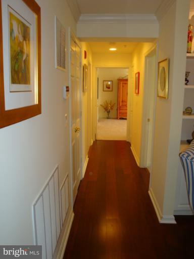 12021 Tralee Road, Unit 201 Lutherville-Timonium, MD 21093 - Photo 2 of 30 a view of a bathroom from the hallway