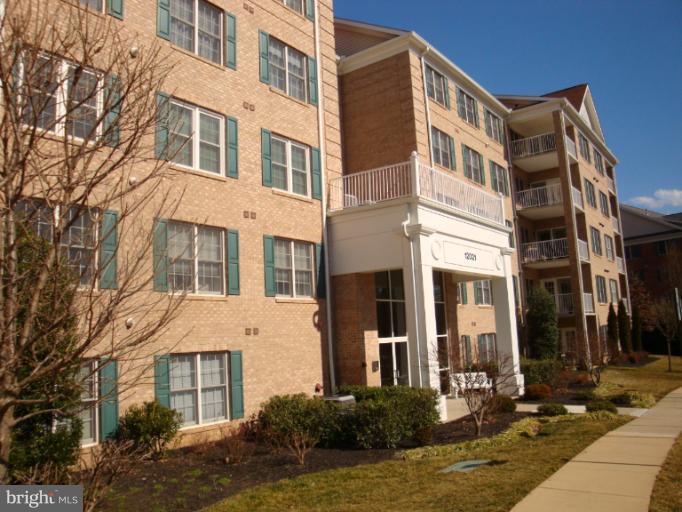12021 Tralee Road, Unit 201 Lutherville-Timonium, MD 21093 - Photo 28 of 30 a front view of a multi story building