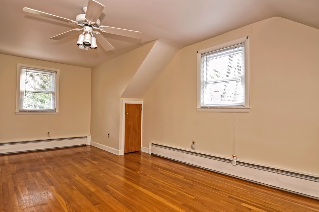66 Old Post Road Walpole, MA 02032 - Photo 25 of 30 wooden floor in an empty room with a window