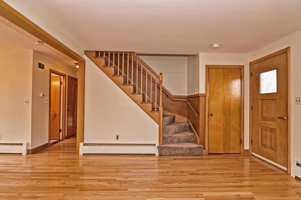 66 Old Post Road Walpole, MA 02032 - Photo 8 of 30 a view of entryway and hall with wooden floor