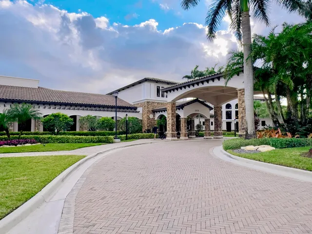 a park view with a basket ball court