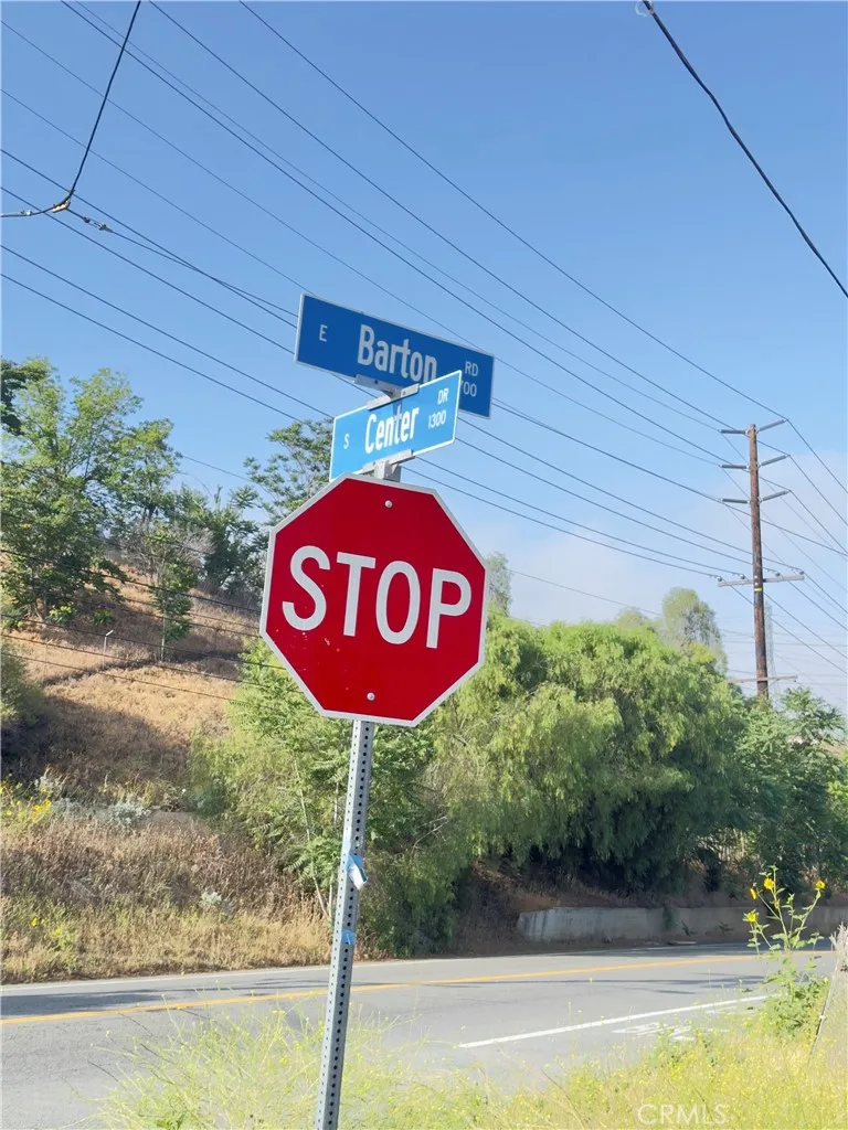 0 Center Drive Colton, CA 92324 - Photo 12 of 12 a view of a street sign under a large tree