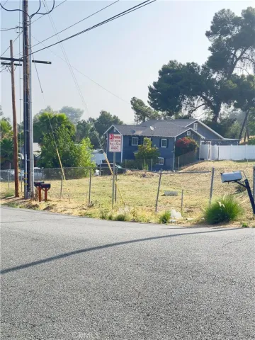 a view of a terrace with a road and windows