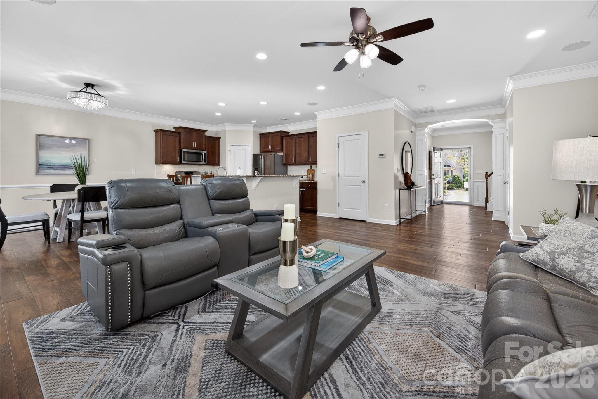2032 Pinyon Lane Lancaster, SC 29720 - Photo 13 of 44 a living room with furniture a ceiling fan and a rug